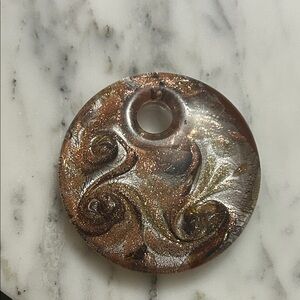 Elegant Swirl Art Piece Glass Pendant in Bronze and Silver